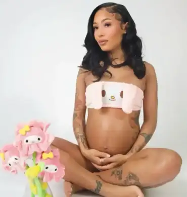 Coi Leray poses in her maternity shoot as she reveals the gender of her baby with Trippie Redd