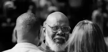 Bishop T.D. Jakes with daughter Sarah Jakes and her husband, making a significant announcement about his role at Potter’s House Church, sparking reactions from their community.