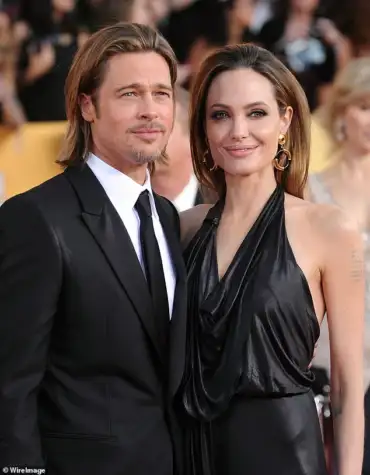 Brad Pitt and Angelina Jolie pictured during happier times, as Pitt reflects on regrets and his strained relationship with their children.