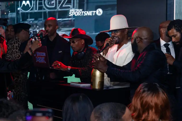 Jamie Foxx surrounded by celebrities and friends during his BET Icon Award celebration in Beverly Hills.