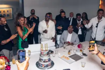 Jamie Foxx celebrates BET Icon Award surrounded by celebrities and friends at a glamorous Beverly Hills party.